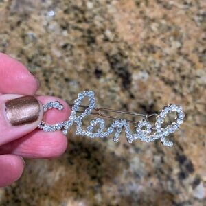 Absolutely stunning Chanel hair clip with Crystals in writing Chanel ,must have!